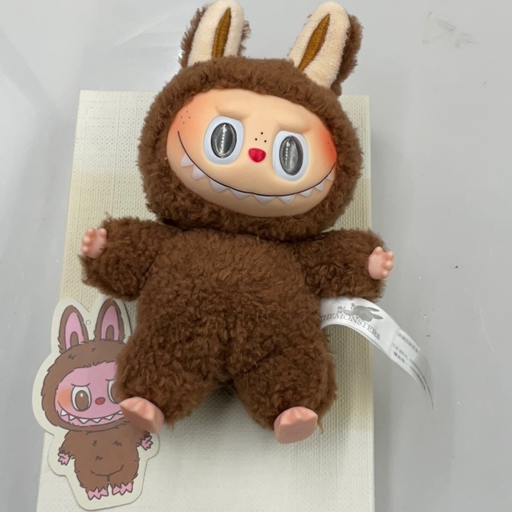HardToFindVerifiedPOPMARTExciting Macaron. TheMonsters”Toffee”Brown Plush Labubu